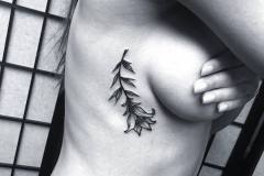 Lily.  #lily #flowertattoo #tattoo #mediapa #philadelphiatattoo #langdaleart #sideboob #lillies #blacktattoo