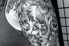 Shading is fresh.  Some of this is a coverup/reworking of an old tattoo on the shoulder.
.
.
.
.
#hummingbird #hummingbirdtattoo #floralart #flowertattoo #violets #floraltattoo #blackworktattoo #blackworkers_tattoo #delicatetattoo